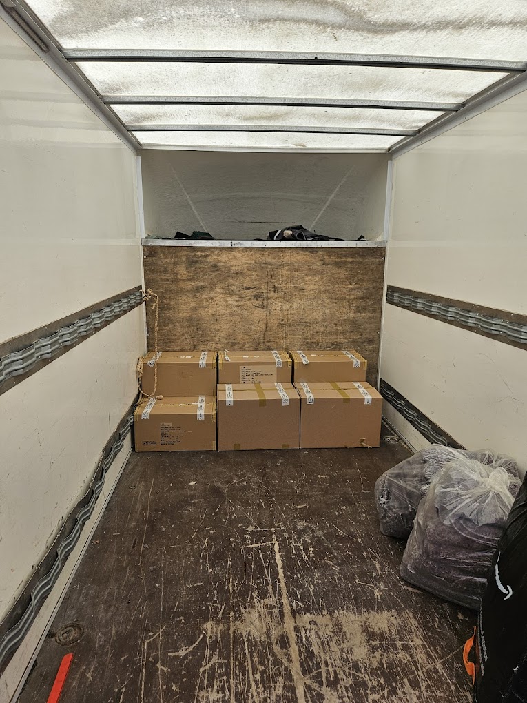 Merit Removals van with boxes securely and neatly placed in a Luton van for safe transport in Manchester