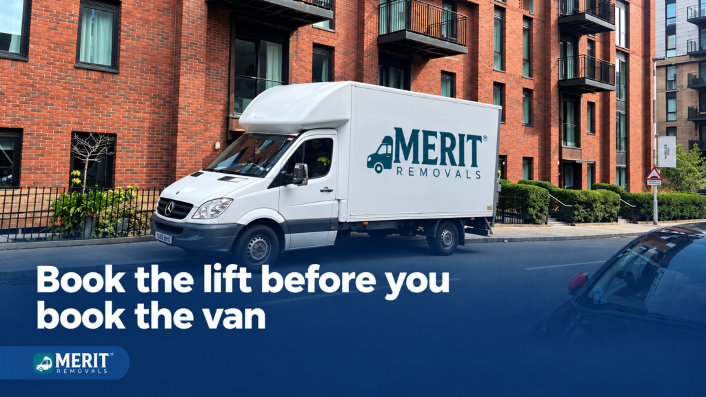 Merit Removals crew carrying boxes into a lift in a Manchester city centre apartment building